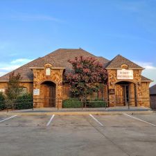 Clean, professional medical spa treatment room with neutral tones at Soza Clinic Bedford in Fort Worth