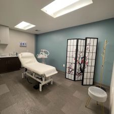Clean, professional medical spa treatment room with neutral tones at Viogene Chalcedony Aesthetics in Encino