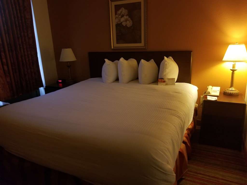 Ramada by Wyndham Suites Orlando Airport | 7500 Augusta National Dr, Orlando, FL 32822, USA | Phone: (407) 641-5484