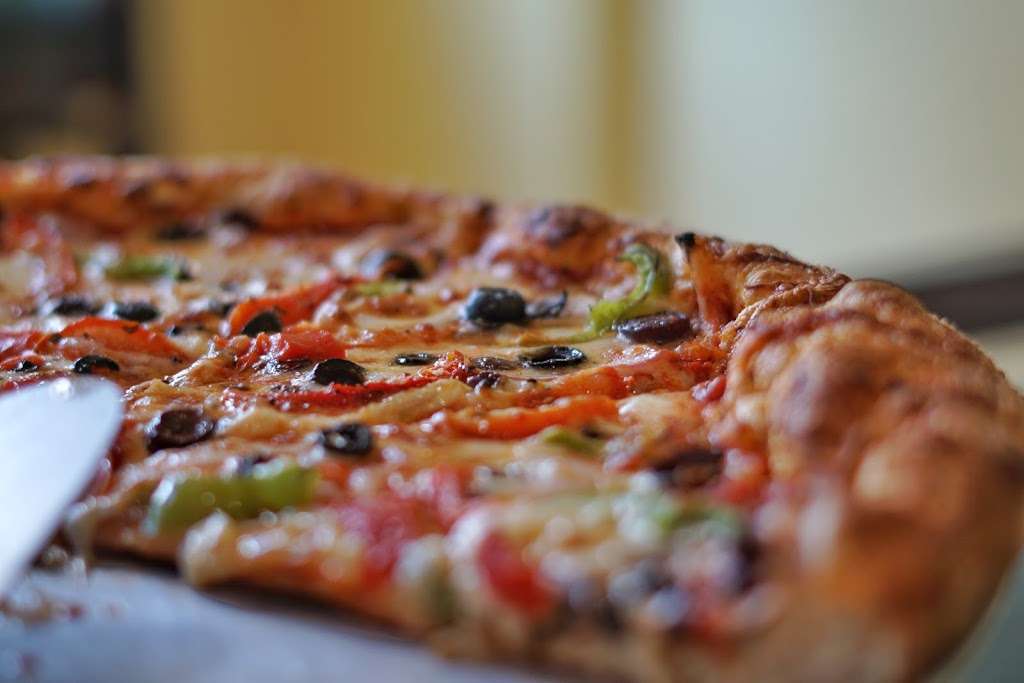 Marinis Pizza | 7998, 12820 Walden Rd #5, Montgomery, TX 77356, USA | Phone: (936) 582-5556
