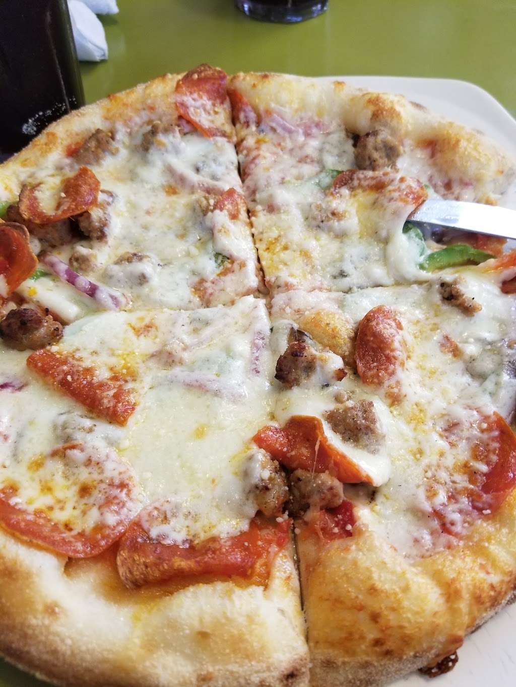 Flippers Pizzeria | 3216 Rolling Oaks Blvd, Kissimmee, FL 34747, USA | Phone: (407) 390-0552