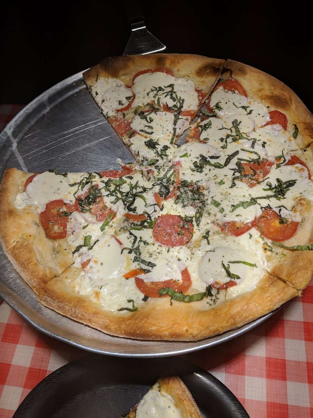 Tomasinos Pizza III | 920 International Pkwy #1016, Lake Mary, FL 32746, USA | Phone: (407) 333-7499
