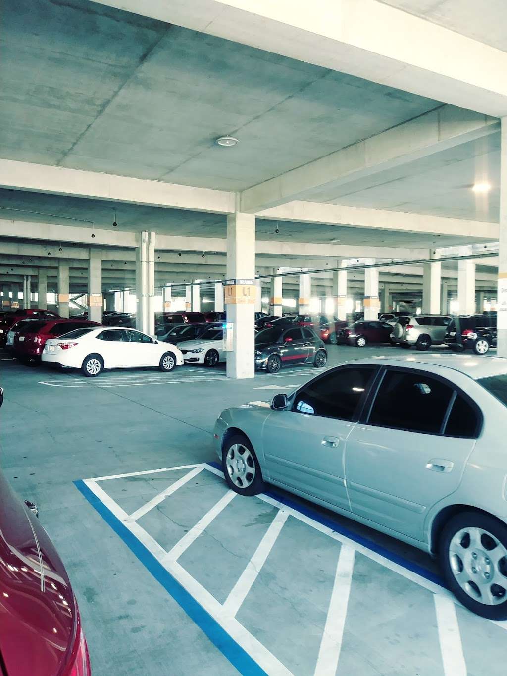 Lime Parking Garage | 1652-1668 Buena Vista Dr, Orlando, FL 32836, USA | Phone: (407) 934-7639