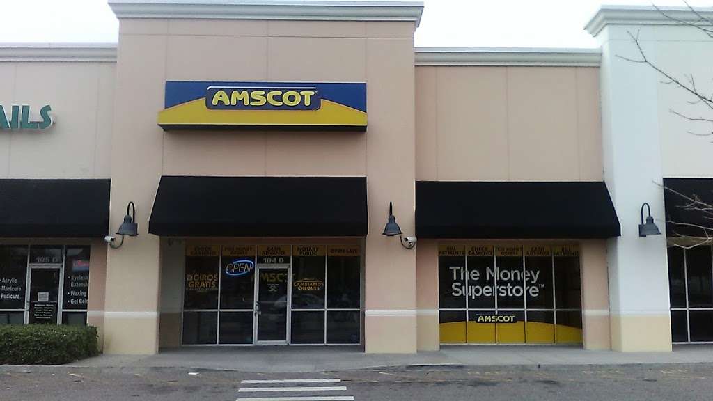 Amscot - The Money Superstore | 1697-D N Woodland Blvd #104, DeLand, FL 32720, USA | Phone: (386) 734-1394