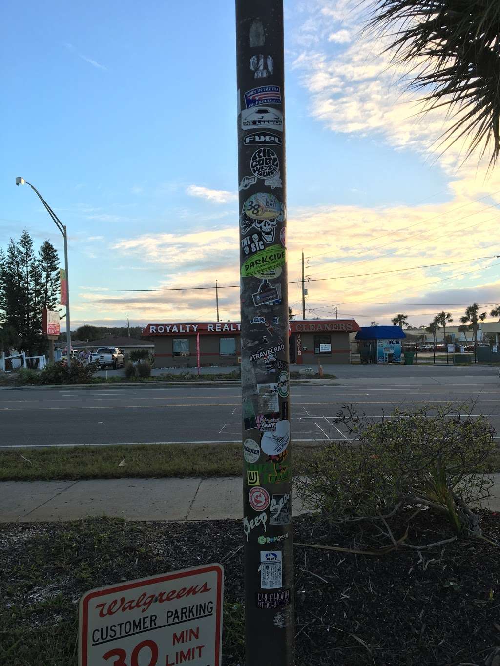 Street Art Sticker Light Pole | 800 Florida A1A, New Smyrna Beach, FL 32168, USA