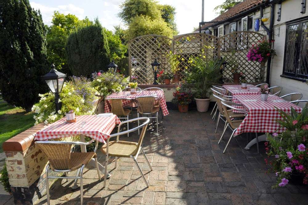 The Woodman | 155 London Rd, Stanford Rivers, Ongar CM5 9QF, UK | Phone: 01277 362019