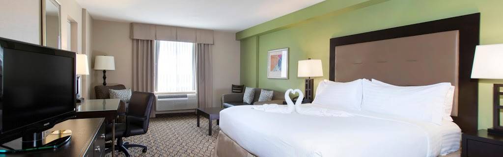 Holiday Inn & Suites Across From Universal Orlando | 5905 S Kirkman Rd, Orlando, FL 32819, USA | Phone: (407) 351-3333