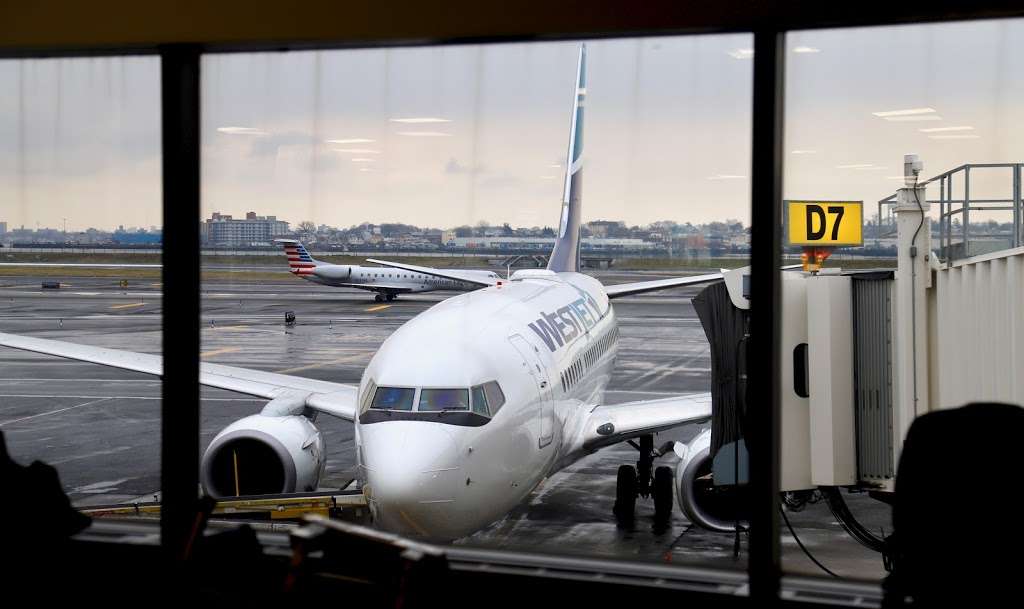 West Jet | Terminal D - Lower Level - Stop 2, P4, Queens, NY 11371, USA | Phone: (718) 779-2018
