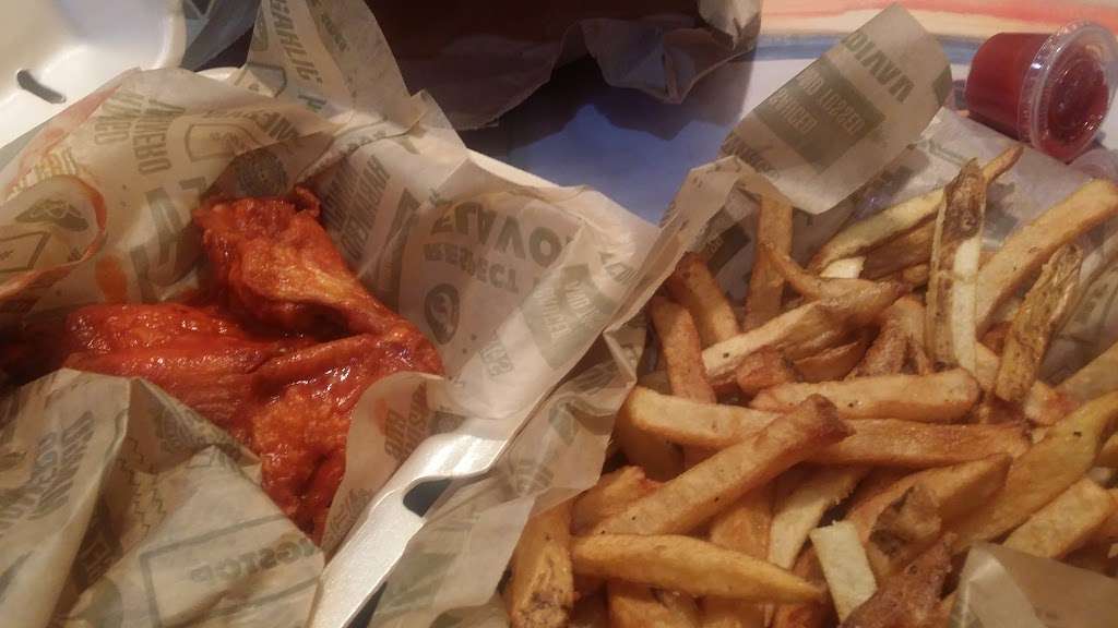 Wingstop | 9804 Jones Rd a, Houston, TX 77065, USA | Phone: (281) 477-9464