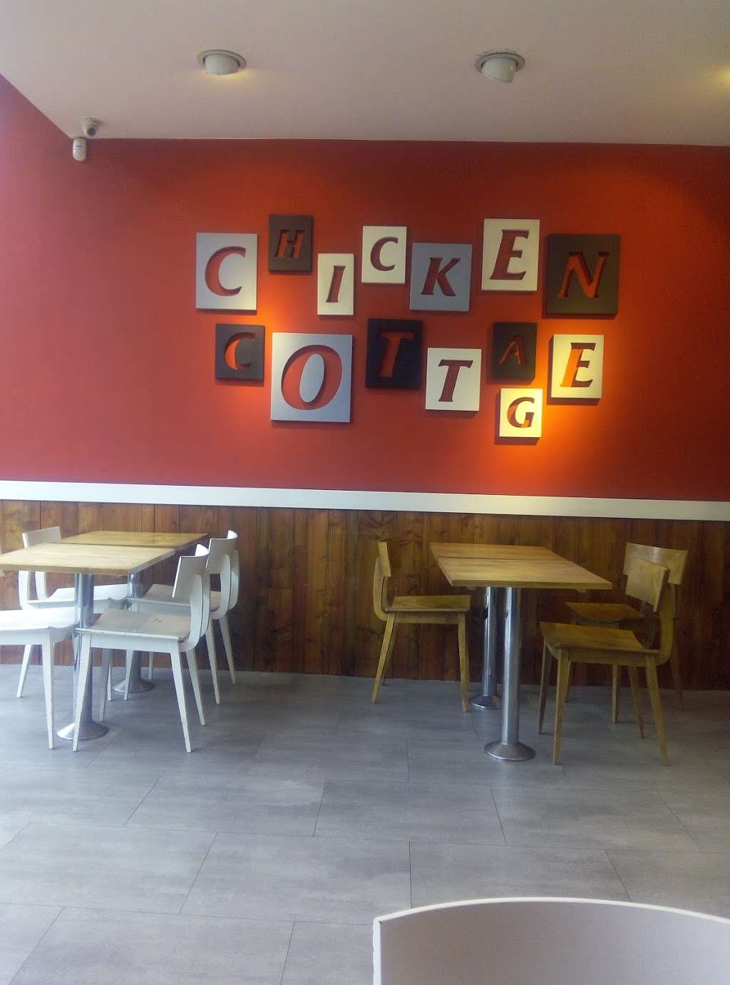 Chicken Cottage West Kensington | 82 North End Rd, Hammersmith, London W14 9ES, UK | Phone: 020 7603 2471