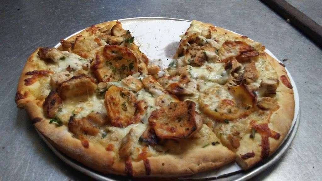 Pizza Capri | 1501 E 53rd St, Chicago, IL 60615, USA | Phone: (773) 324-7777