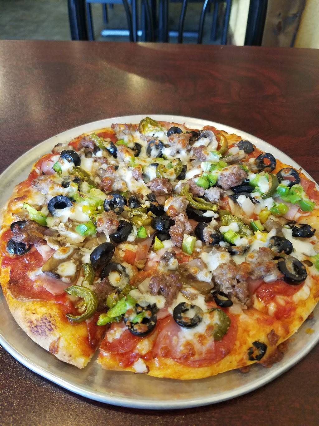 Johnnys Pizza House | 8873 Highland Rd, Baton Rouge, LA 70808, USA | Phone: (225) 763-9797