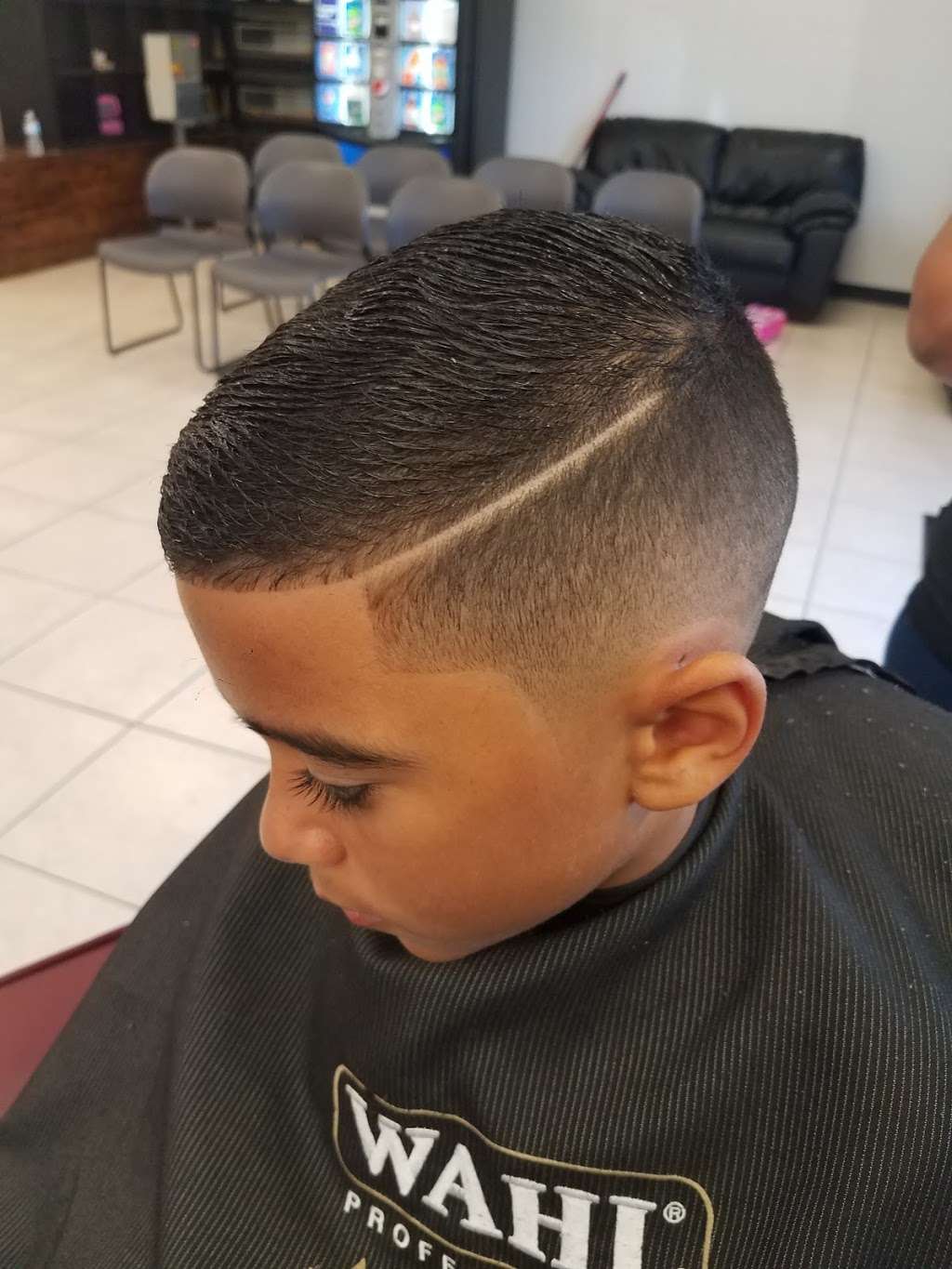Revolution Barber & Nails By Yiyi | 4110 S Orange Blossom Trail, Kissimmee, FL 34746, USA | Phone: (321) 746-3185