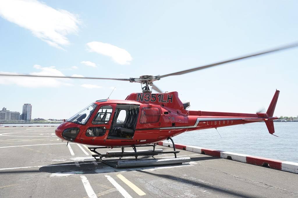 Liberty Helicopters Sightseeing Tours and Charter | 6 E River Bikeway, New York, NY 10004, USA | Phone: (212) 967-6464