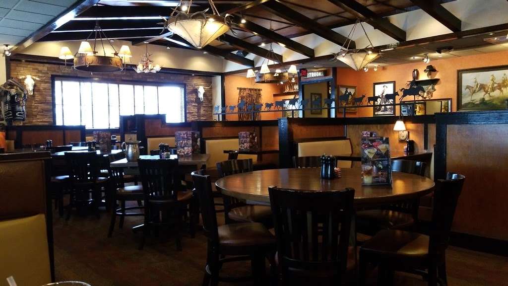 LongHorn Steakhouse | 12901 S Orange Blossom Trail, Orlando, FL 32837, USA | Phone: (407) 854-5400