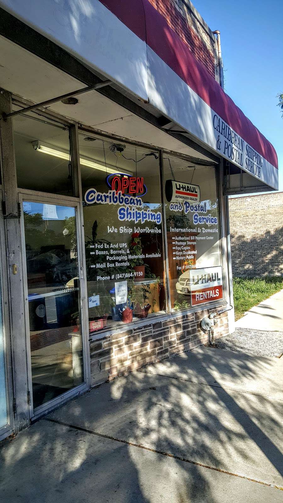 Caribbean Shipping & Postal | 721 Howard St, Evanston, IL 60202, USA | Phone: (847) 864-9150