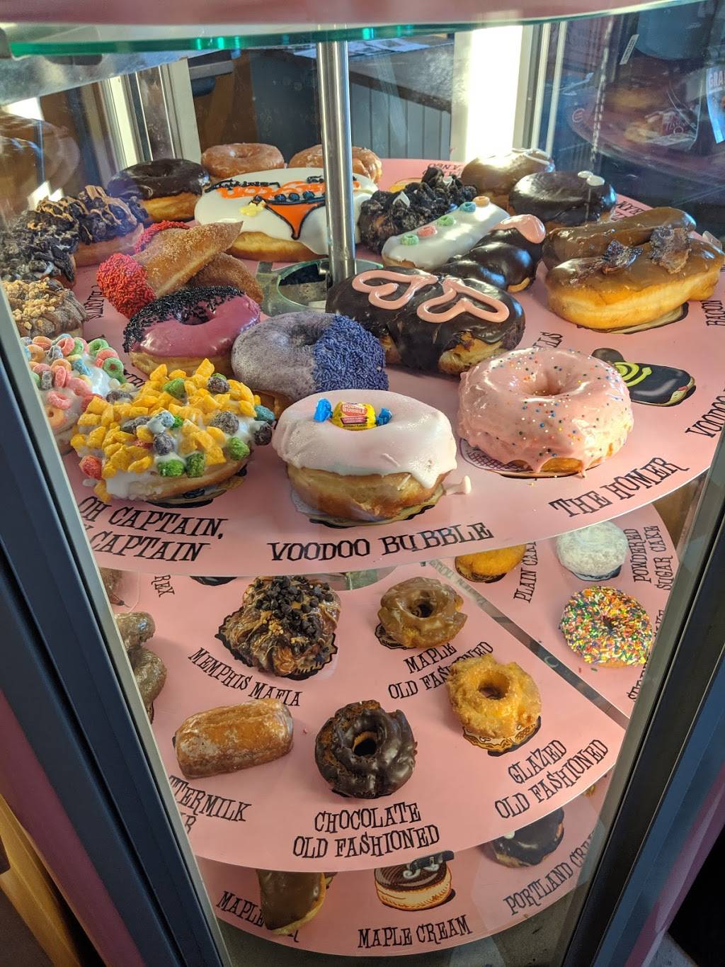 Voodoo Doughnut - Colfax | 1520 E Colfax Ave, Denver, CO 80218, USA | Phone: (303) 597-3666