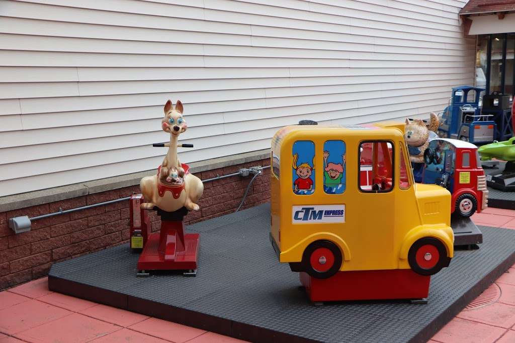 Kids toy automatic car runs with quarter dollar coin | Wrentham Street, Wrentham, MA 02093, USA