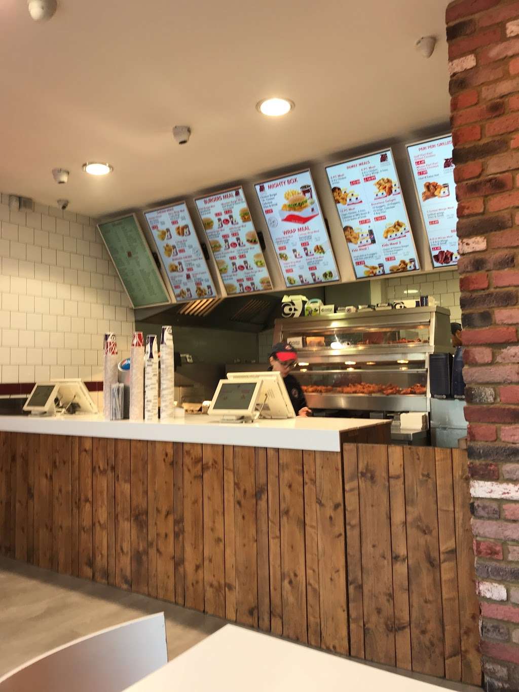 Chicken Cottage West Kensington | 82 North End Rd, Hammersmith, London W14 9ES, UK | Phone: 020 7603 2471