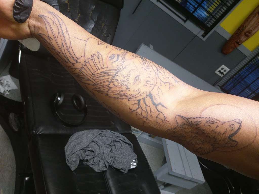 Famous Legs Tattoos | 2278 W Ridge Rd, Gary, IN 46408, USA | Phone: (219) 980-2912