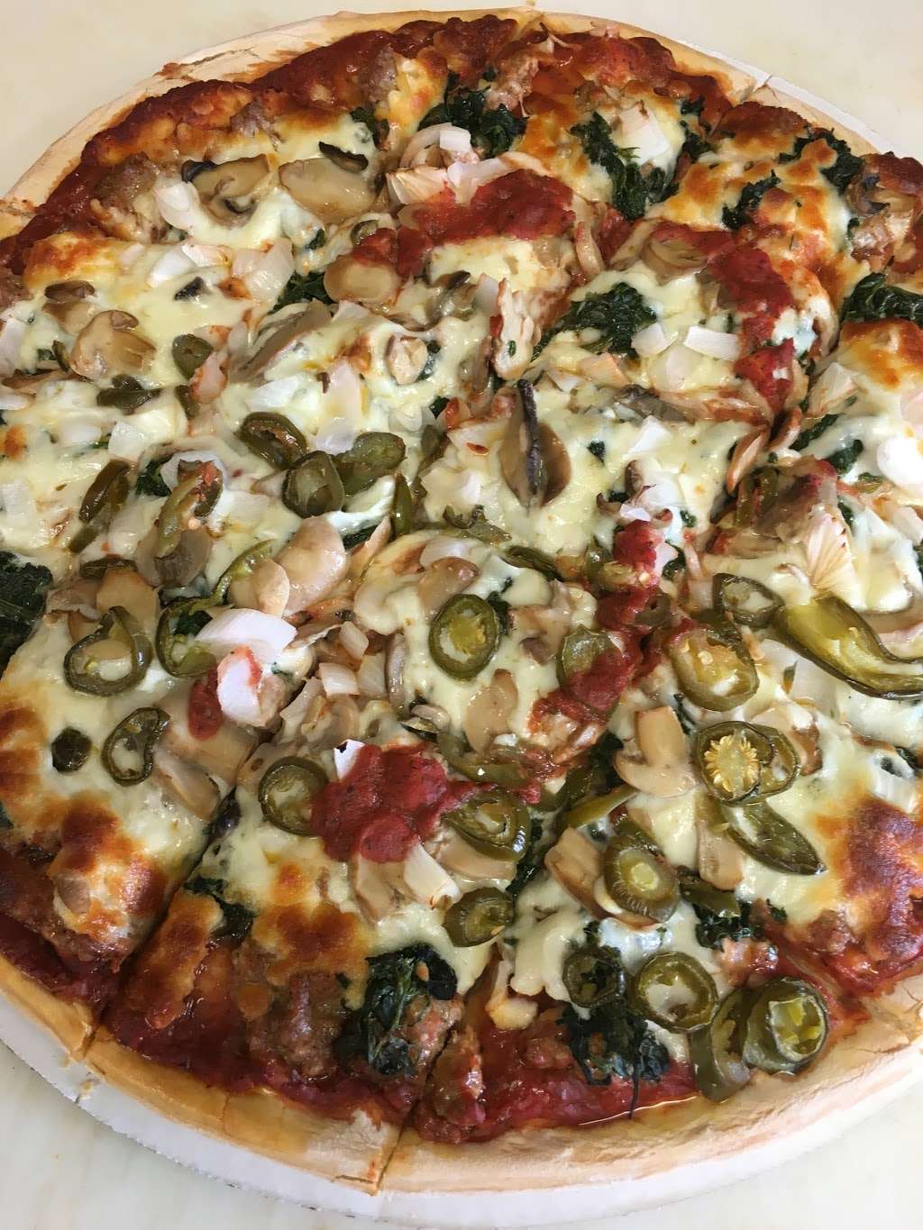 Chucks Pizza | 10123 S Western Ave, Chicago, IL 60643, USA | Phone: (773) 233-4282