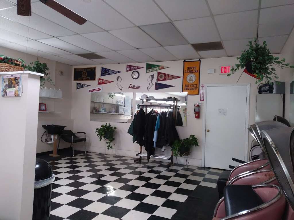 Laporshas Barbershop (circa 1994) | 8829 E W.T. Harris Blvd, Charlotte, NC 28227, USA | Phone: (704) 568-3400