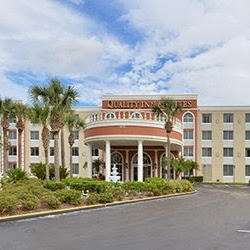 Quality Inn & Suites Near the Theme Parks | 5635 Windhover Dr, Orlando, FL 32819, USA | Phone: (407) 370-5100