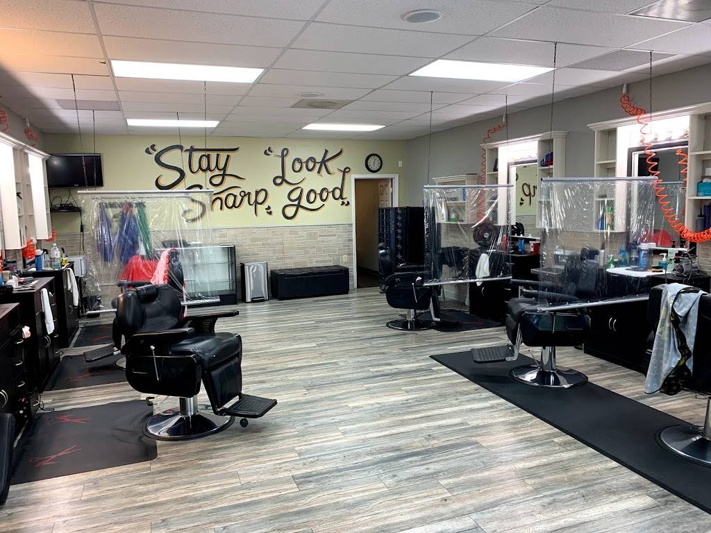 The Real Mens Touch Barbershop - hair care  | Photo 2 of 8 | Address: 4229 Louisburg Rd STE 105, Raleigh, NC 27604, USA | Phone: (919) 758-1984