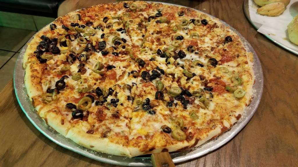 Pizzanos Pizza & Grinderz | 126 California Blvd, Davenport, FL 33897, USA | Phone: (863) 424-9000