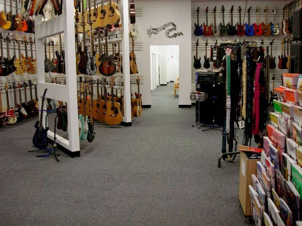 JCs Guitars & Music Lessons | Wind Hills Office Plaza, 2325 Dean St #400, St. Charles, IL 60175, USA | Phone: (630) 513-9932