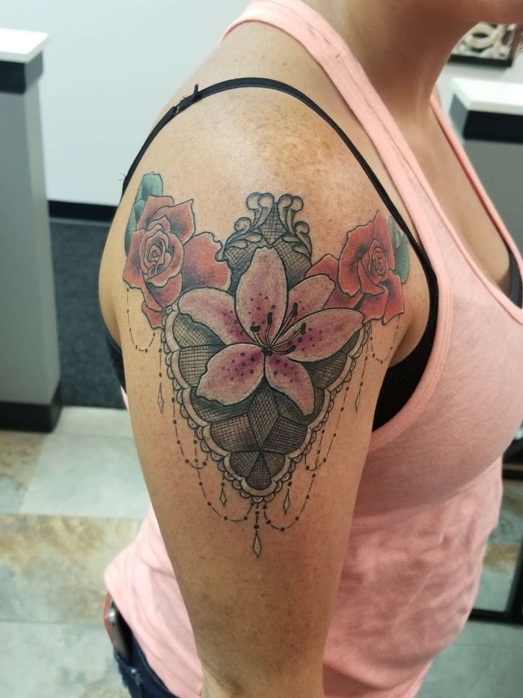 Divine Tattoo Parlor | 5036 NE Parvin Rd, Kansas City, MO 64117 | Phone: (816) 569-2926