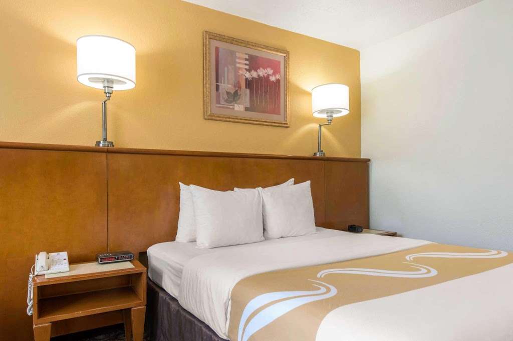 Quality Inn & Suites Near the Theme Parks | 5635 Windhover Dr, Orlando, FL 32819, USA | Phone: (407) 370-5100