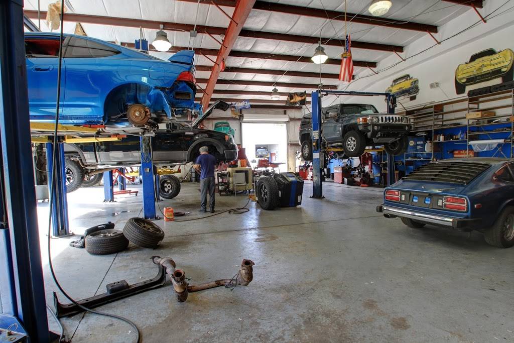 Mad Hatter Auto Repairs and Mufflers | 4916 W Linebaugh Ave STE 101, Tampa, FL 33624, USA | Phone: (813) 374-9230