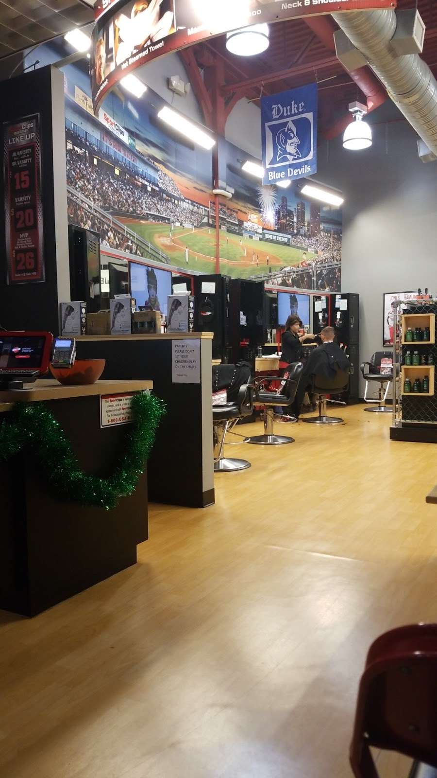 Sport Clips Haircuts of RiverGate at Steele Creek | 14145 Rivergate Pkwy Ste. 100, Charlotte, NC 28273, USA | Phone: (704) 588-7177