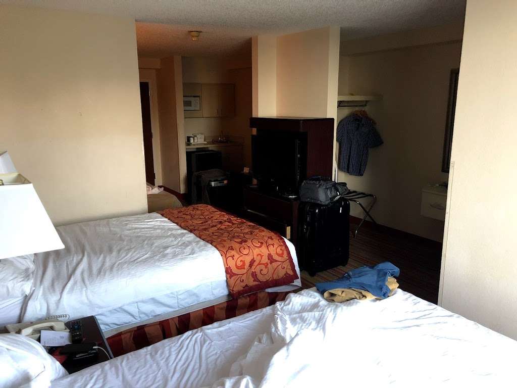 Ramada by Wyndham Suites Orlando Airport | 7500 Augusta National Dr, Orlando, FL 32822, USA | Phone: (407) 641-5484