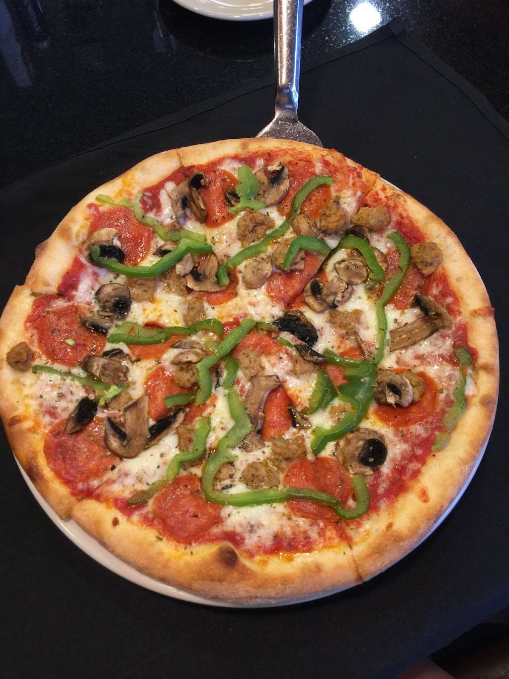 Russos New York Pizzeria Conroe | 3915 W Davis St #180, Conroe, TX 77304, USA | Phone: (936) 539-5900