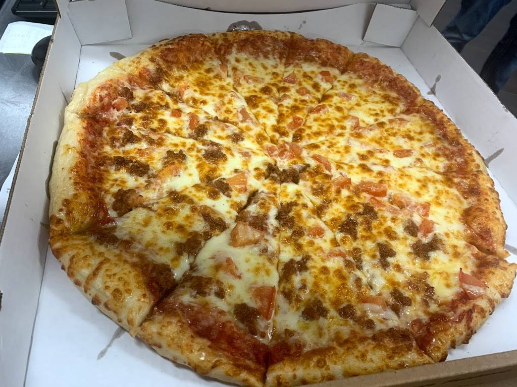 Toarminas Pizza | Inside of The Durfee Innovation Society Building, 2470 Collingwood St, Detroit, MI 48206, USA | Phone: (313) 883-2424