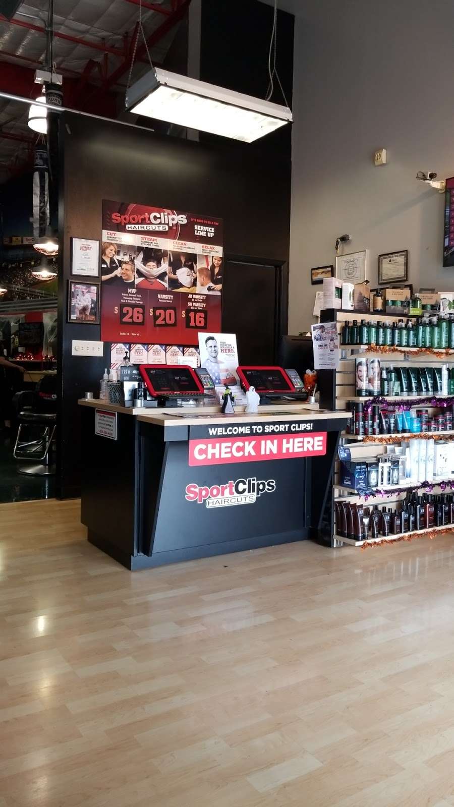 Sport Clips Haircuts of Kemah Park Retail Center | 212 FM 518 Ste. 104, Kemah, TX 77565, USA | Phone: (281) 334-9200