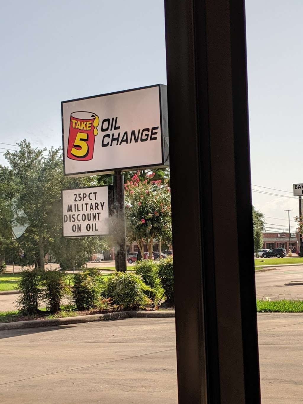 Quicker Sticker & Lube | 114 W Baker Rd, Baytown, TX 77521, USA | Phone: (281) 837-9777