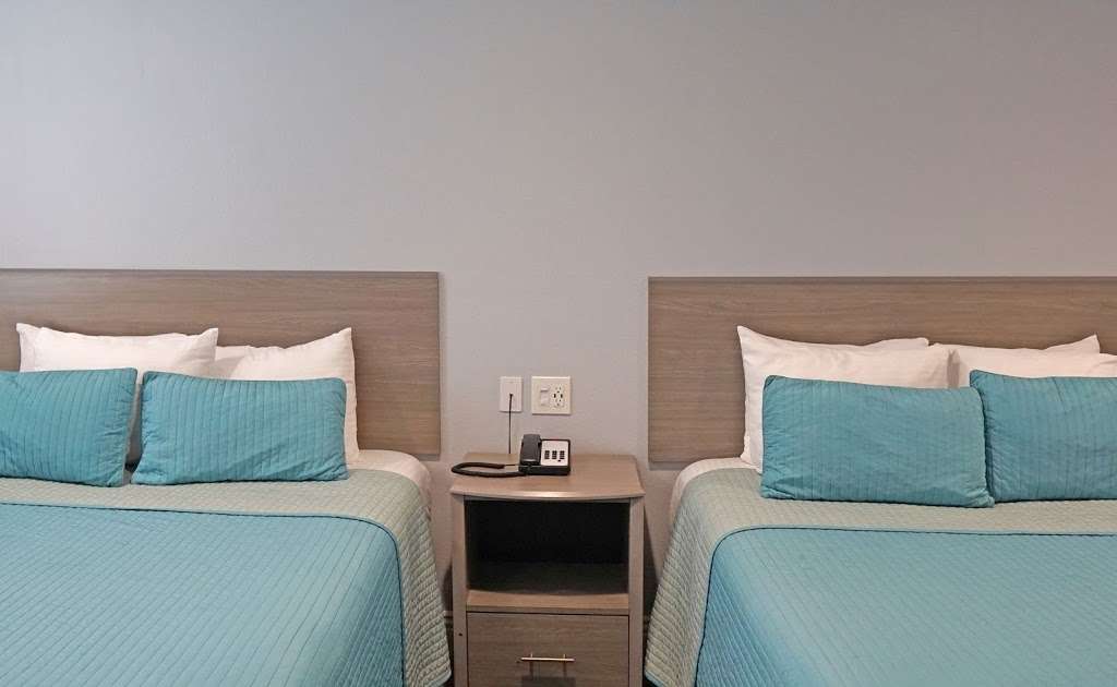 Surf City Inn | 16220 CA-1, Huntington Beach, CA 92649, USA | Phone: (562) 592-4959