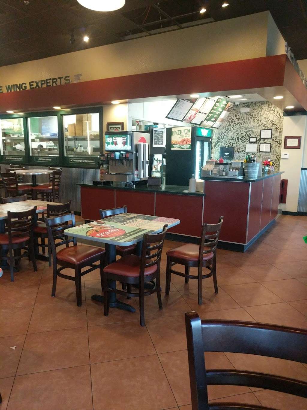 Wingstop | 12717 Interstate 45 N Ste 100, Willis, TX 77318, USA | Phone: (936) 890-9464