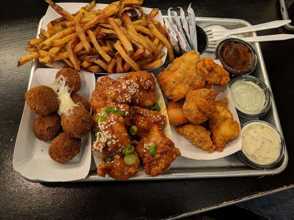 The Nugget Spot | 230 E 14th St, New York, NY 10003, USA | Phone: (646) 422-7346