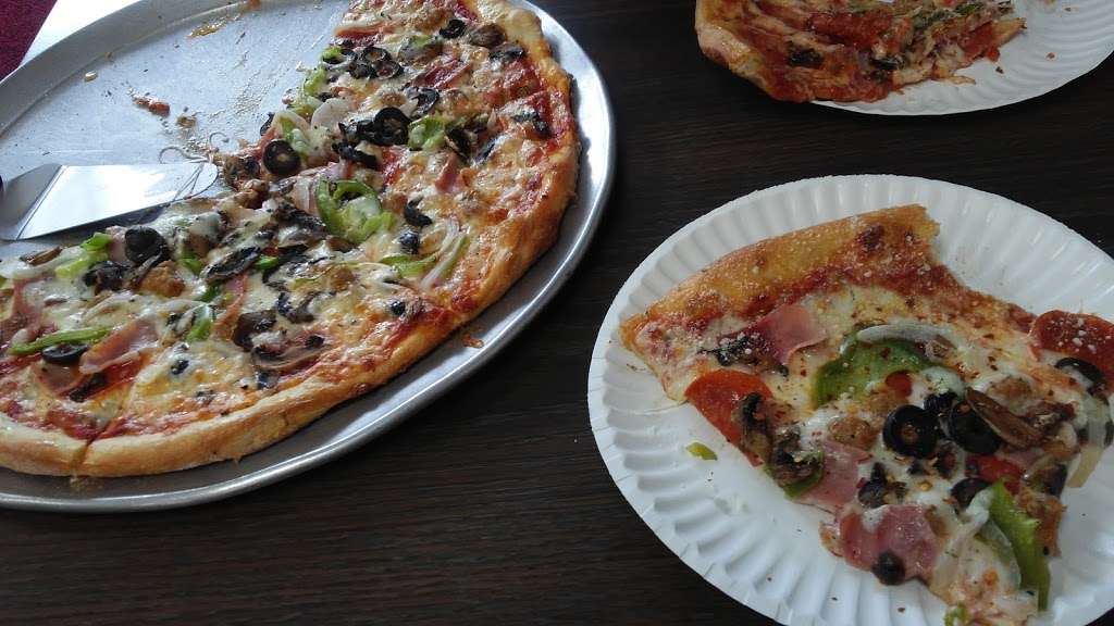 Leos Pizza Subs & More | 2435 Pleasant Hill Rd, Kissimmee, FL 34746, USA | Phone: (407) 846-0989