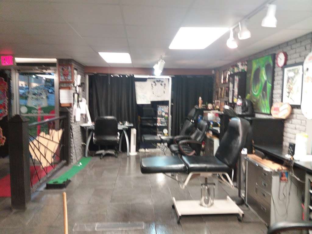 Butchs Tattoo and Body Piercing - store  | Photo 1 of 10 | Address: 106 MO-7, Blue Springs, MO 64014, USA | Phone: (816) 229-7200