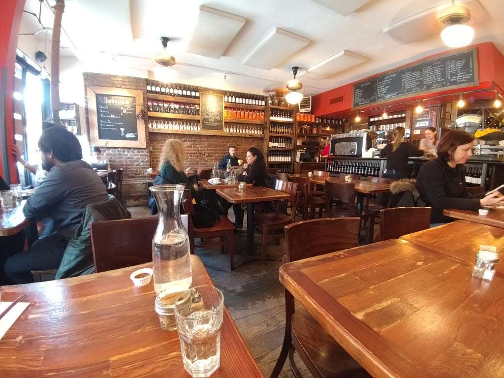 12 Chairs Cafe | 56 Macdougal St # B, New York, NY 10012, USA | Phone: (212) 254-8640