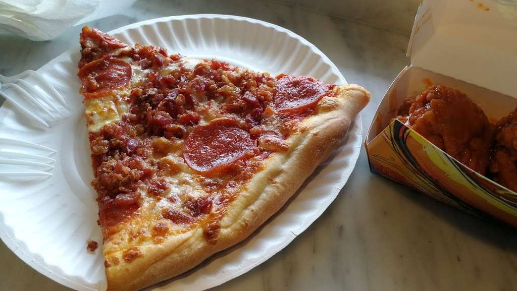 Pizza Plus | Photo 8 of 10 | Address: 4 South St, New York, NY 10004, USA | Phone: (212) 943-1800