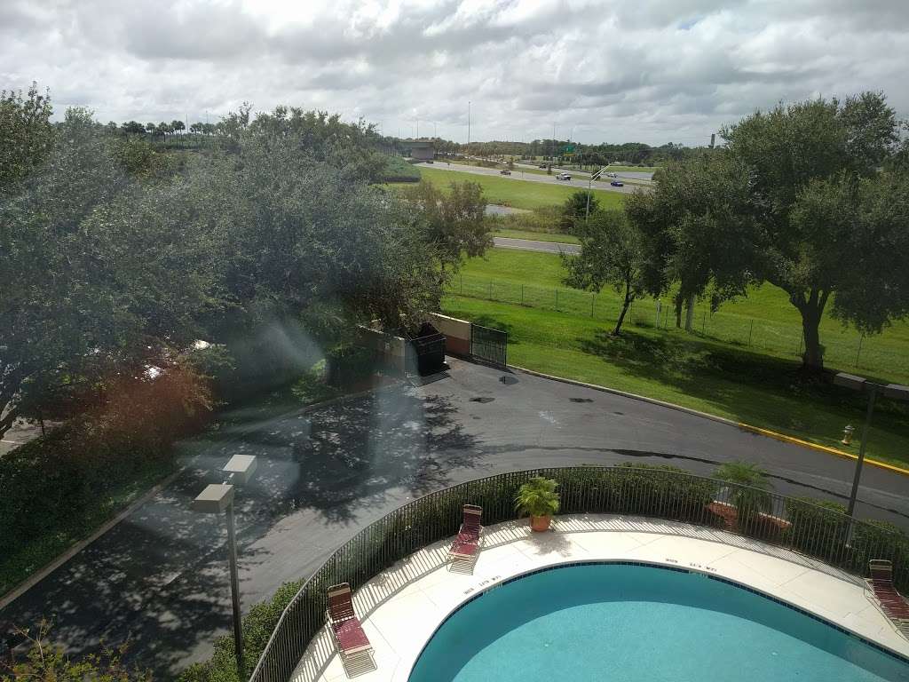 Ramada by Wyndham Suites Orlando Airport | 7500 Augusta National Dr, Orlando, FL 32822, USA | Phone: (407) 641-5484