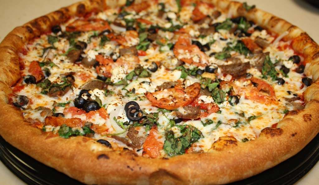 Manny & Olgas Pizza - Rhode Island Ave NE | 2117 Rhode Island Ave NE, Washington, DC 20018, USA | Phone: (202) 526-4100