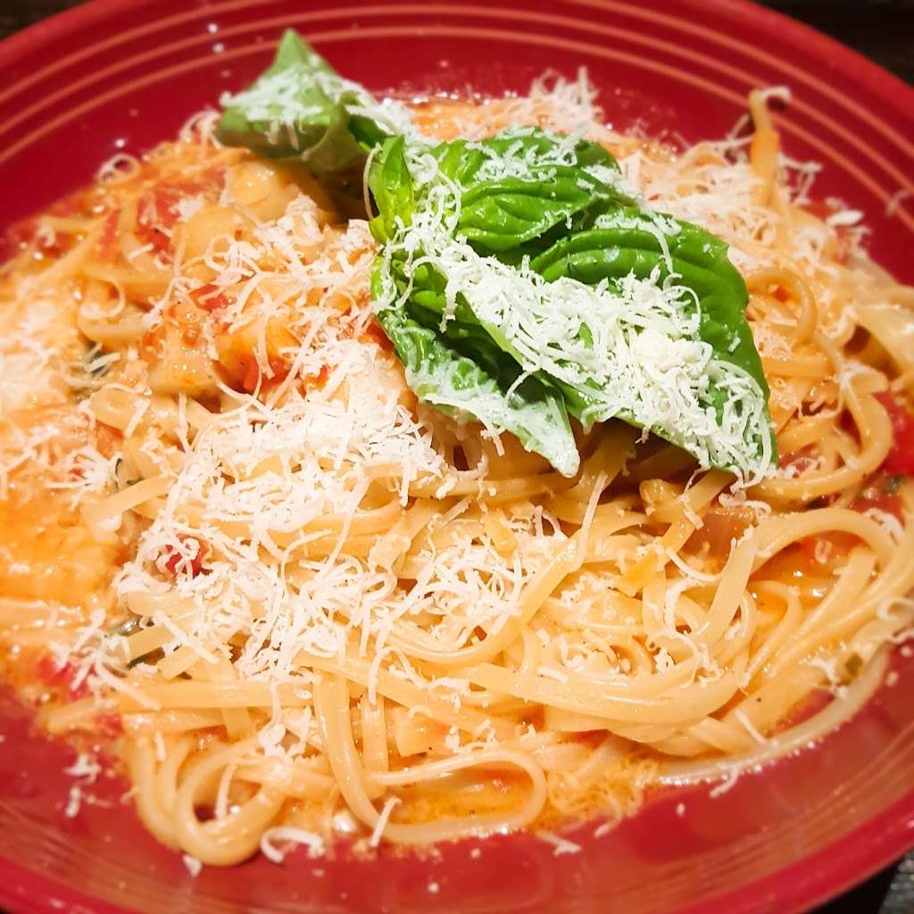 Carrabbas Italian Grill | 8702 Vineland Ave, Orlando, FL 32821, USA | Phone: (407) 938-0015