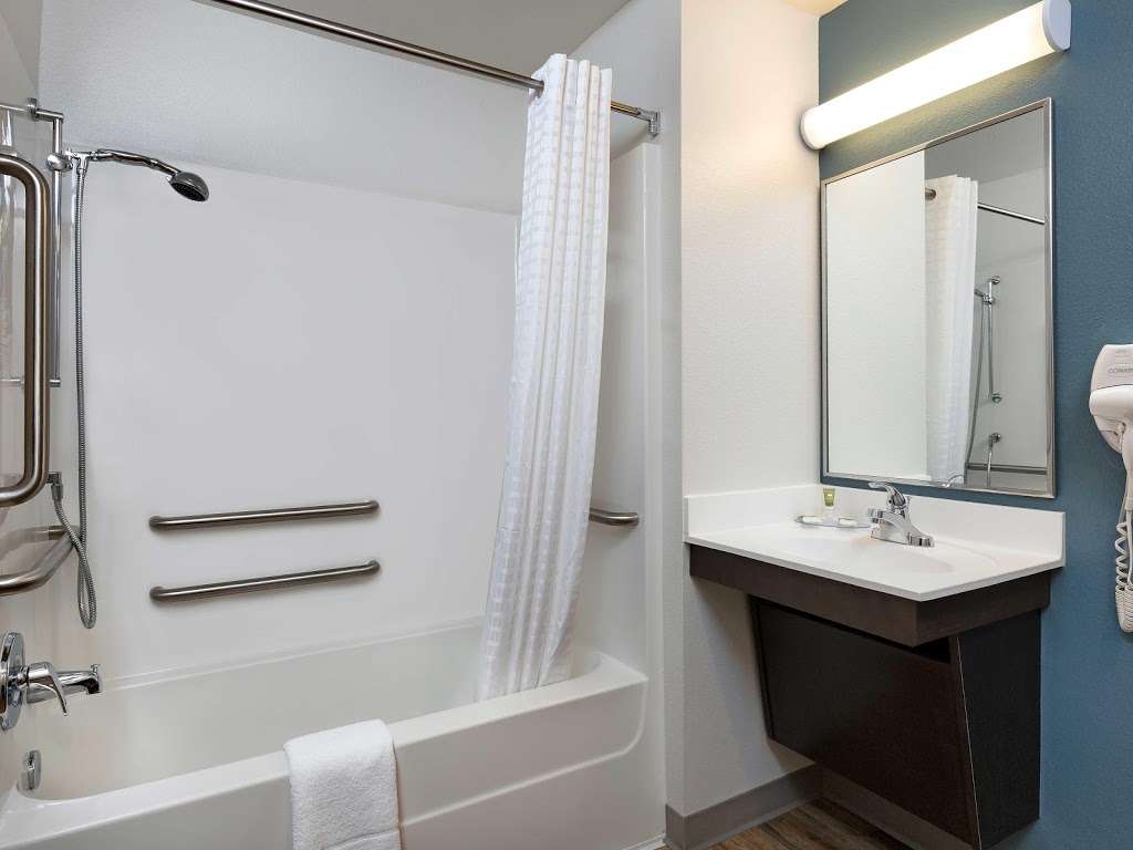 WoodSpring Suites Signature Houston IAH Airport | 18028 Highway 59 N, Humble, TX 77396 | Phone: (832) 960-7133